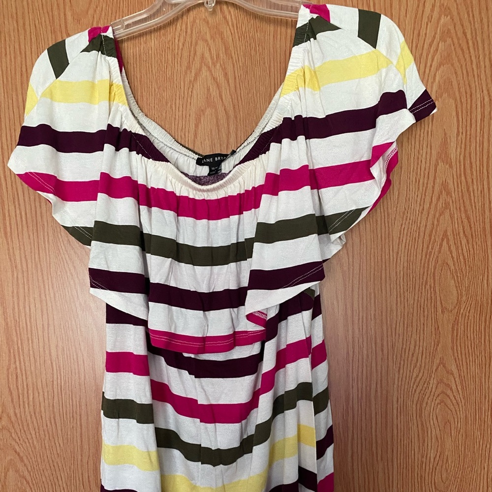 Cute off the shoulder shirt.